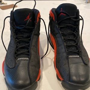 Jordan 13 black on red good condition size12 $125 price is the price NO BOX